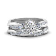 twisted-oval-shaped-diamond-wedding-band-in-white-gold-FDENS3301OV-NL-WG.jpg